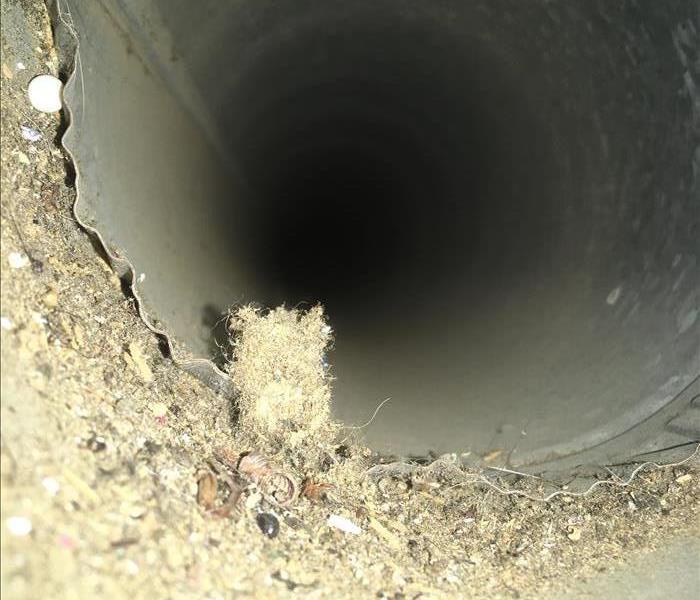 This is a picture of a dirty HVAC line 